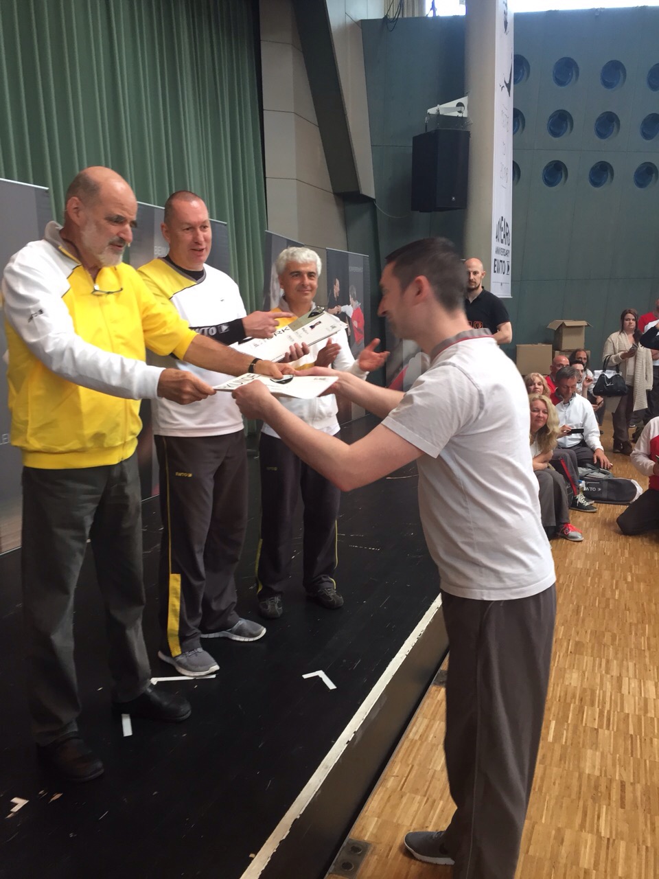 Grandmaster Kernspecht presents Si-Hing Derek Dorris with his 1st Higher Grade Grandmaster Kernspecht presents Derek Dorris with his 1st Higher Grade